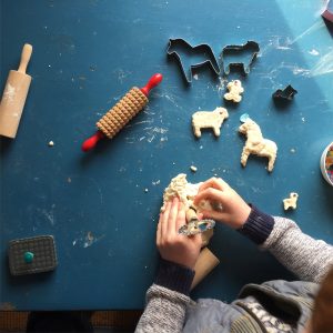 boy playing with homemade salt dough