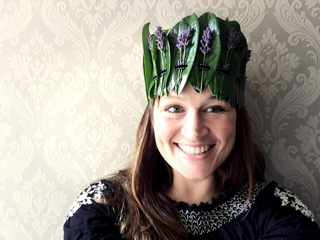 Ulla Lake wearing a woven laurel and lavender crown
