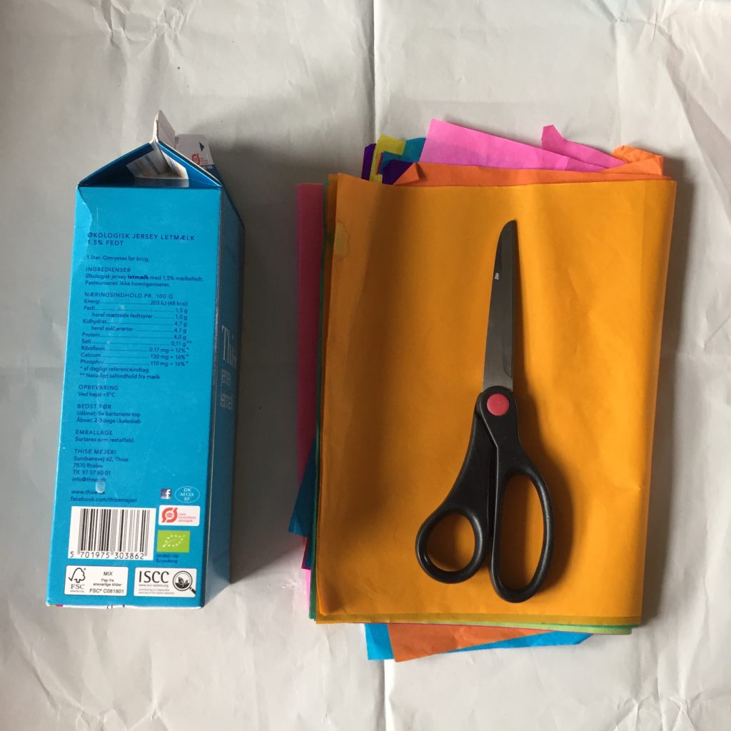 milk carton and tissue paper for making milk carton pinatas