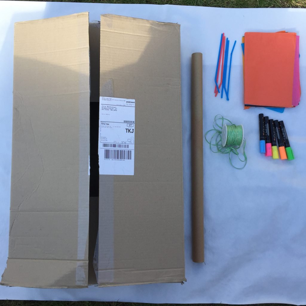 cardboard box, card tube, ribbon, chalk pens and straws