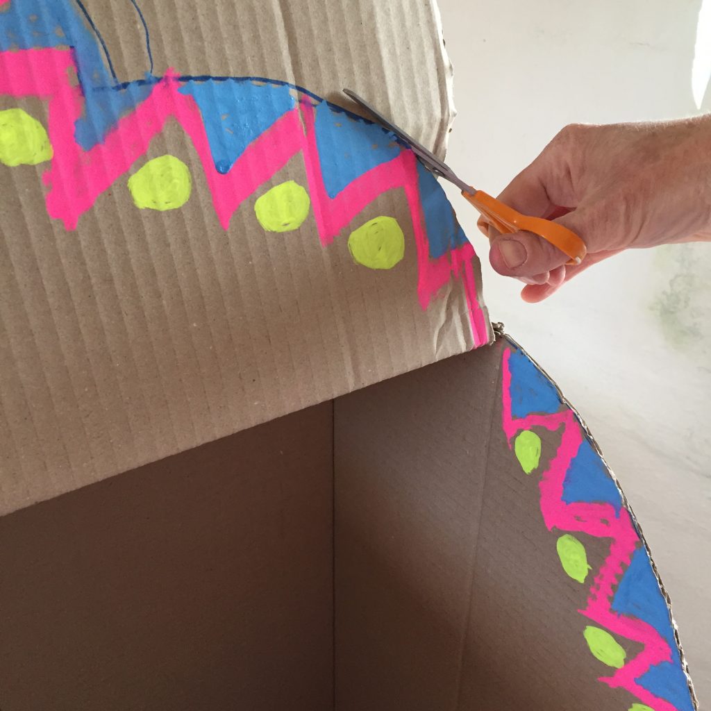 cut off the edges oof the box to achieve a more interesting shape