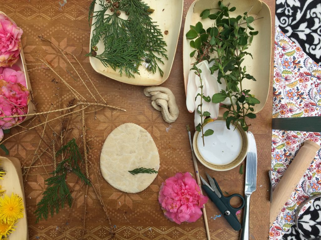 outdoor sensory kids play easter eggs with salt free dough