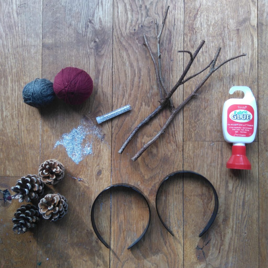 materials for woodland animal headbands diy tutorial made with twigs and cones from the awesome childhood project blog