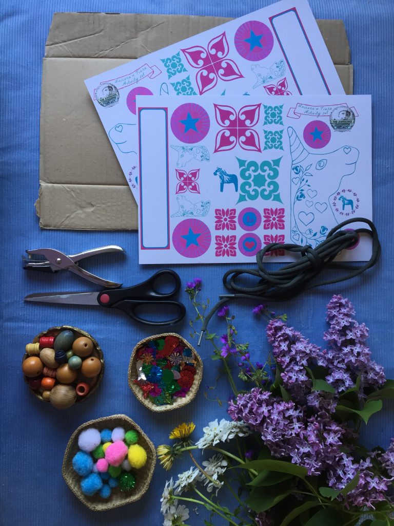 recycled cardboard, FREE printable kids craft PDF, cord, pompoms, sequins for making unicorn nature junk necklaces