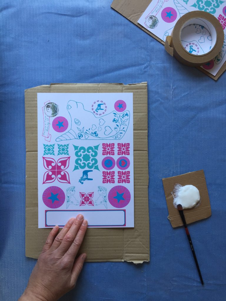 glue your free unicorn kids craft printable to your kids cardboard art for making junk necklaces with children