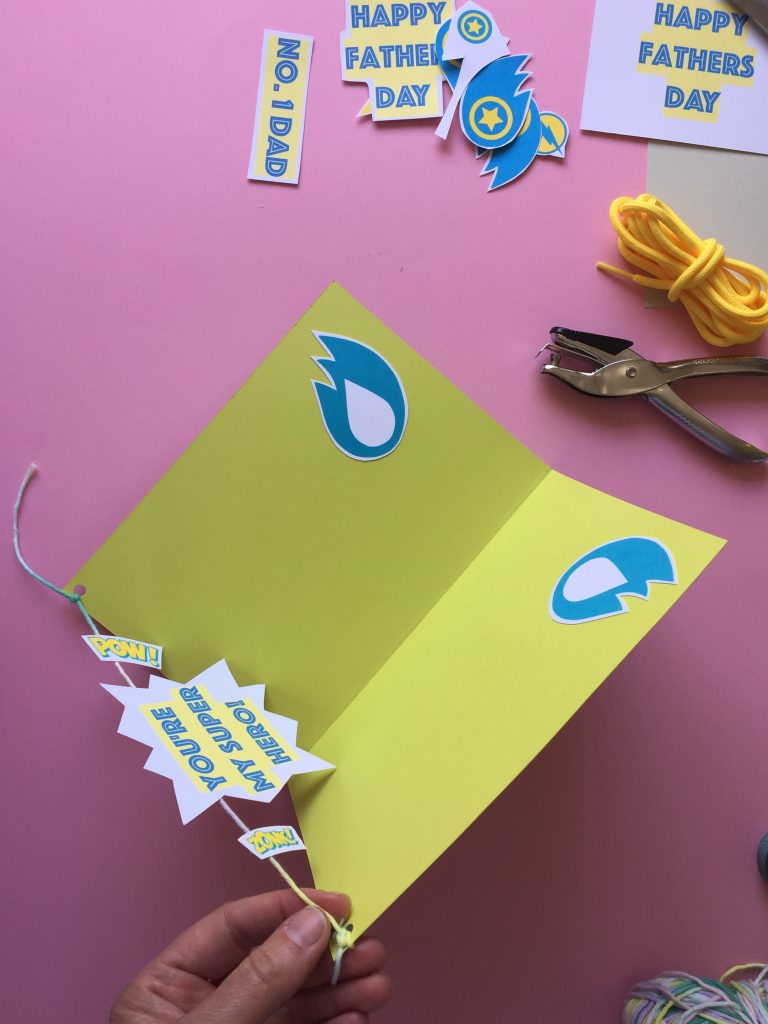 tie the string to your kids craft homemade fathers day card to create the pop up effect